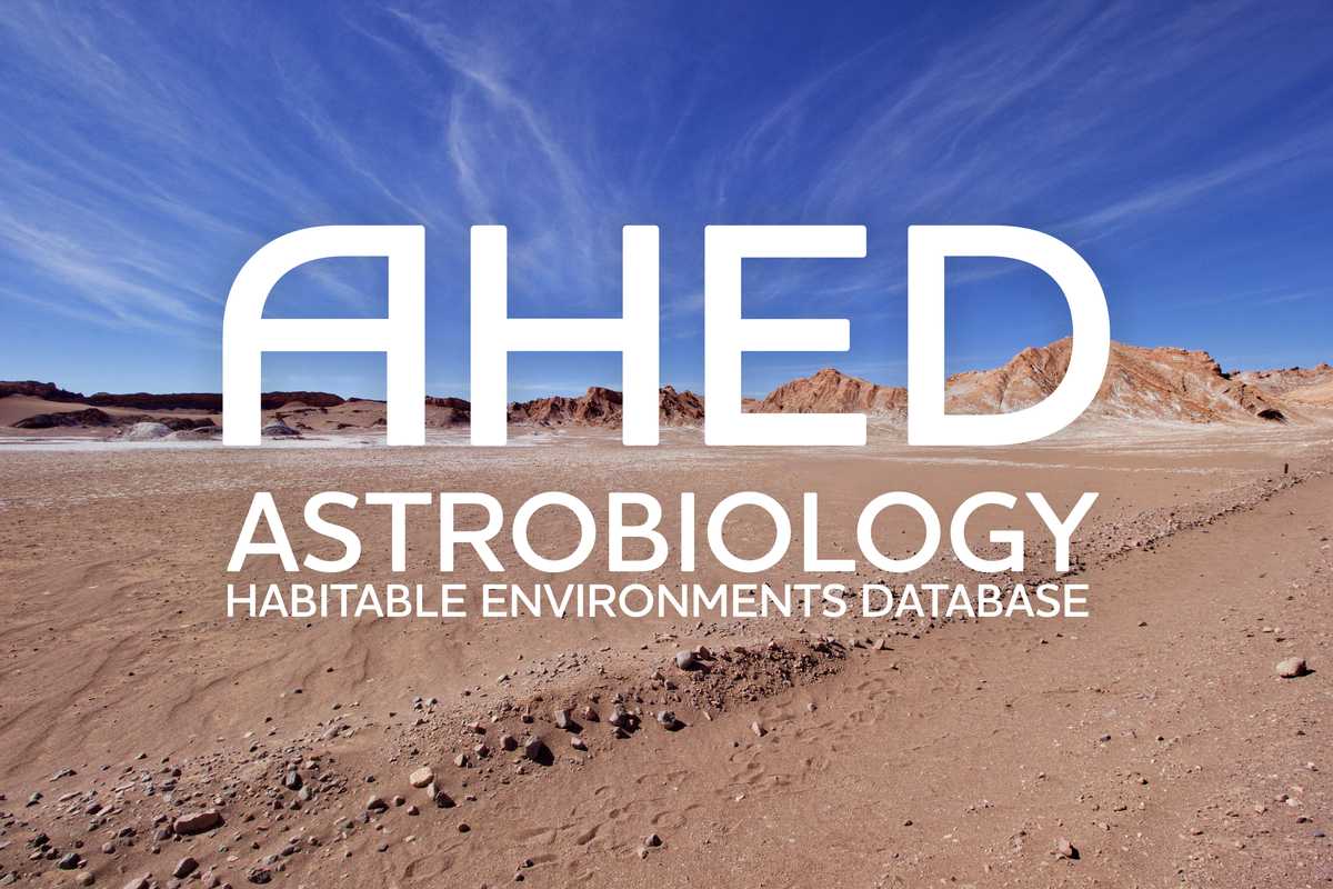 Astrobiology Habitable Environments Database wordmark atop a wideangle photograph of a desertic landscape, with a mountain range and blue sky